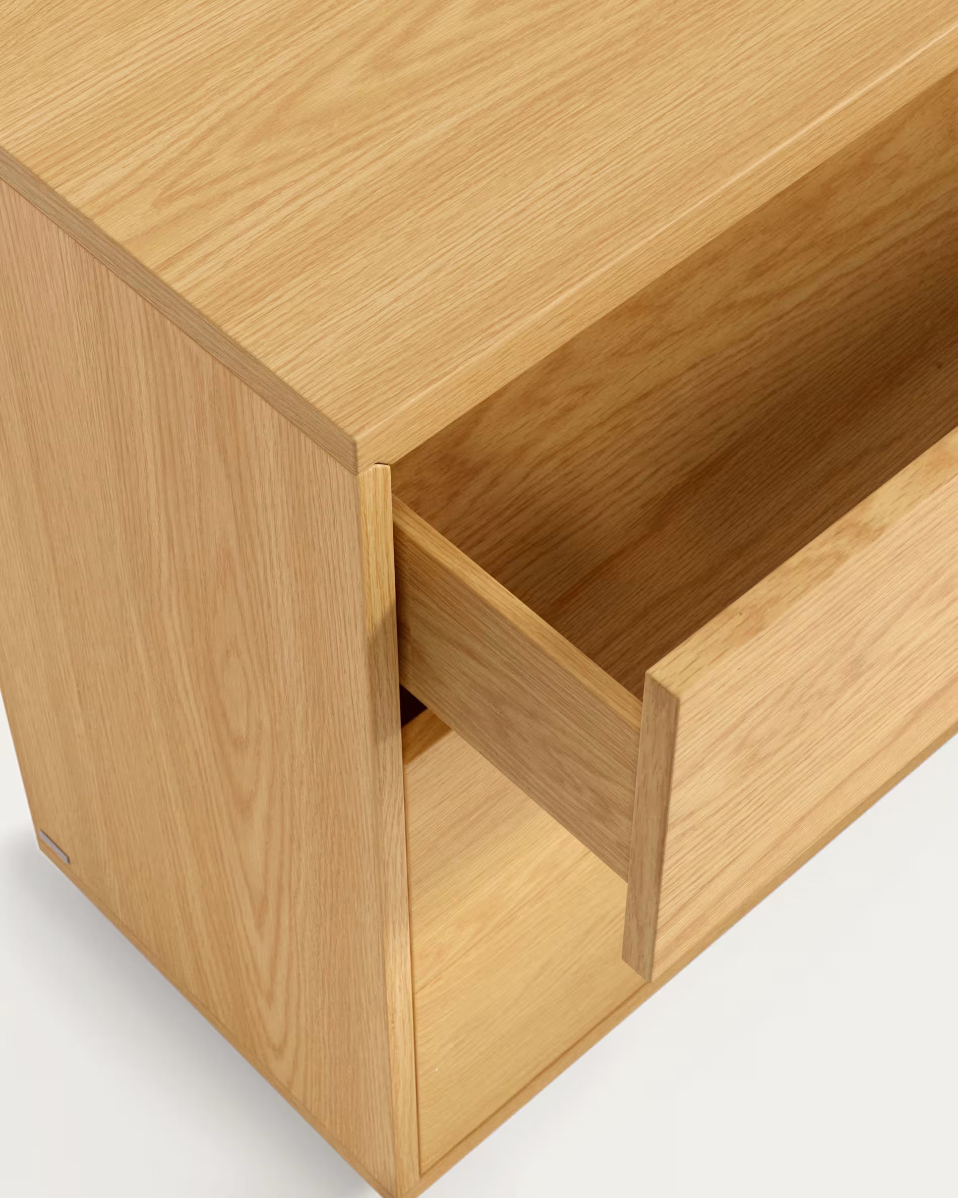 Wooden drawer unit with a single open drawer on a white background