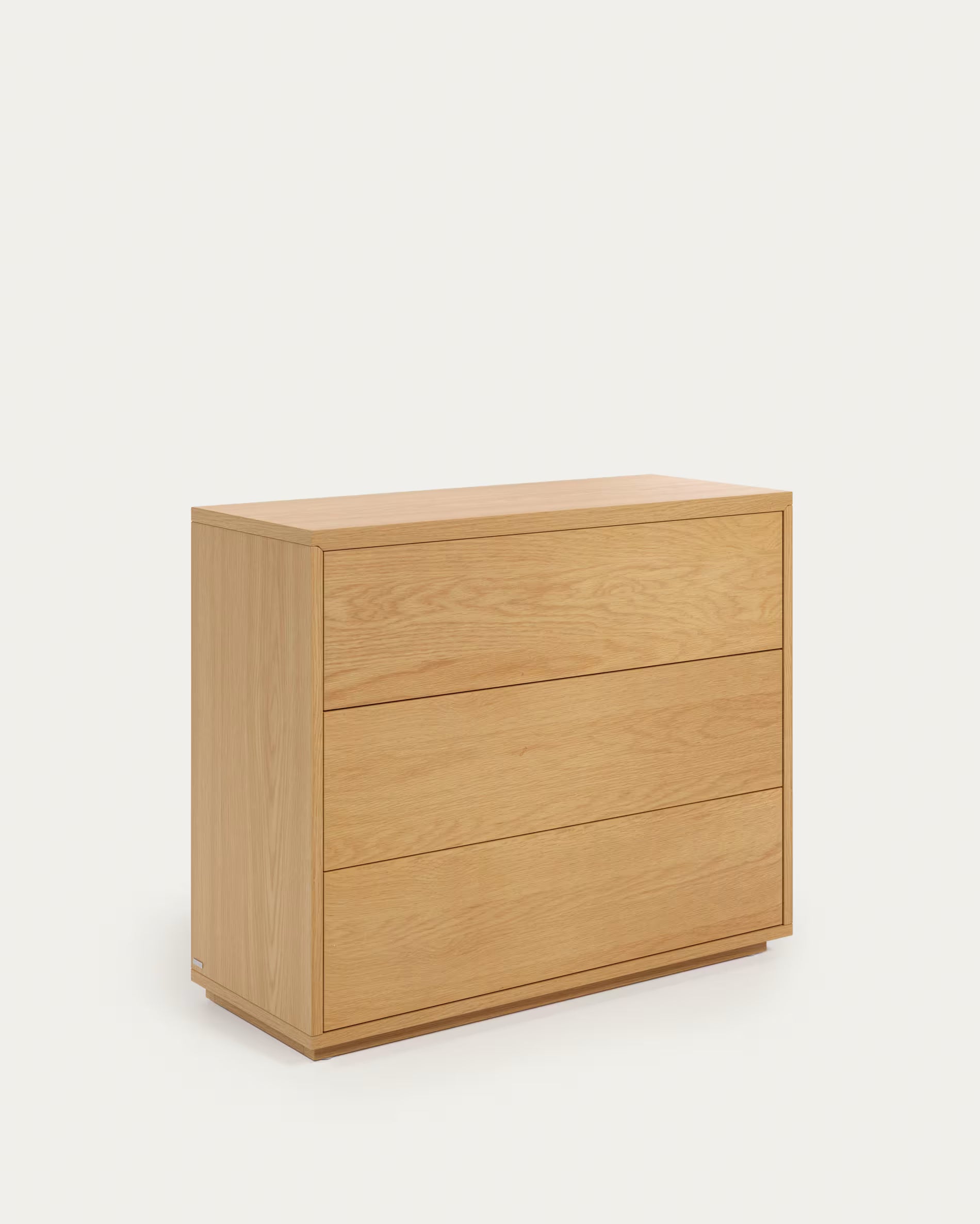 Wooden dresser with three drawers on a white background