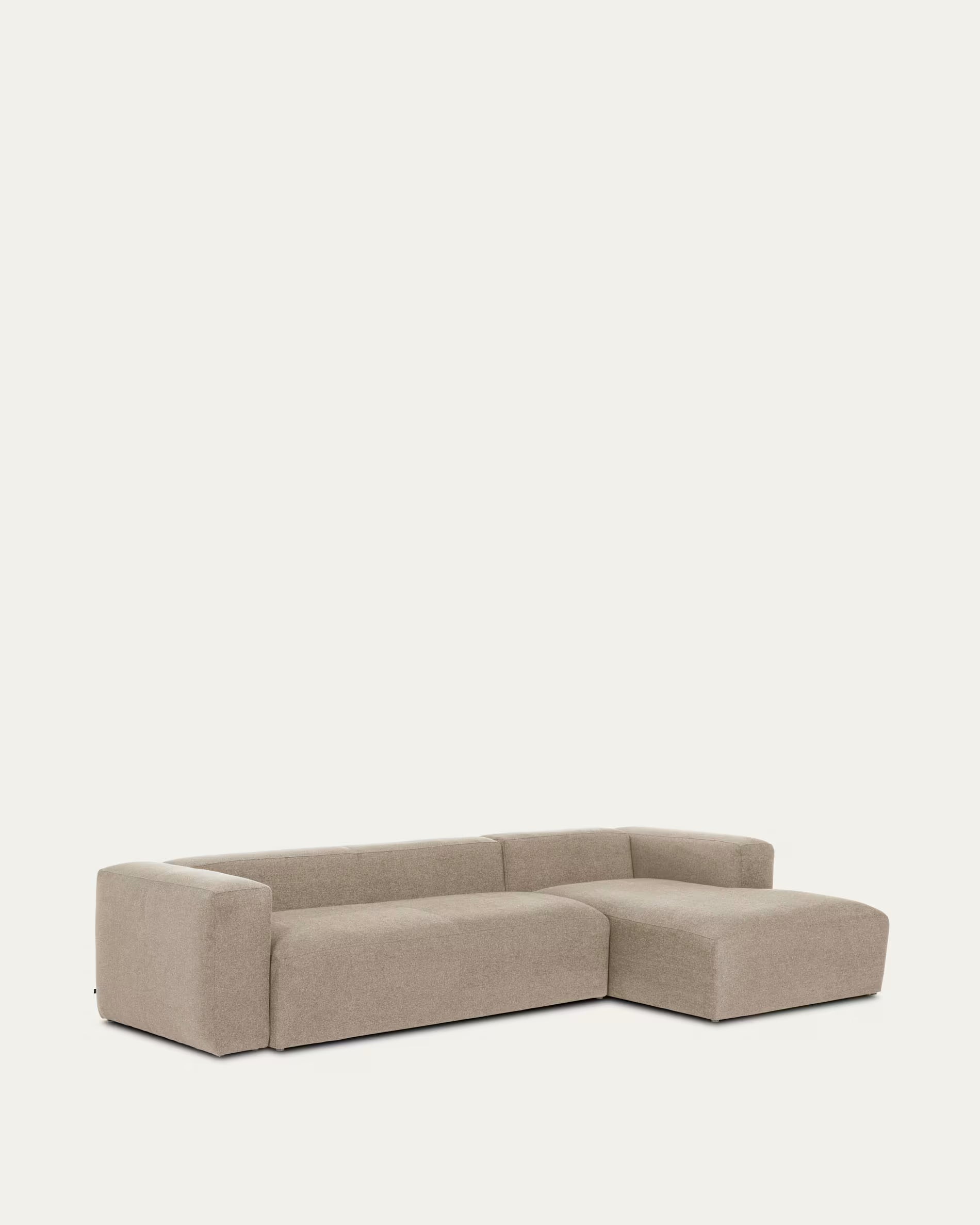 Beige sectional sofa on a white background