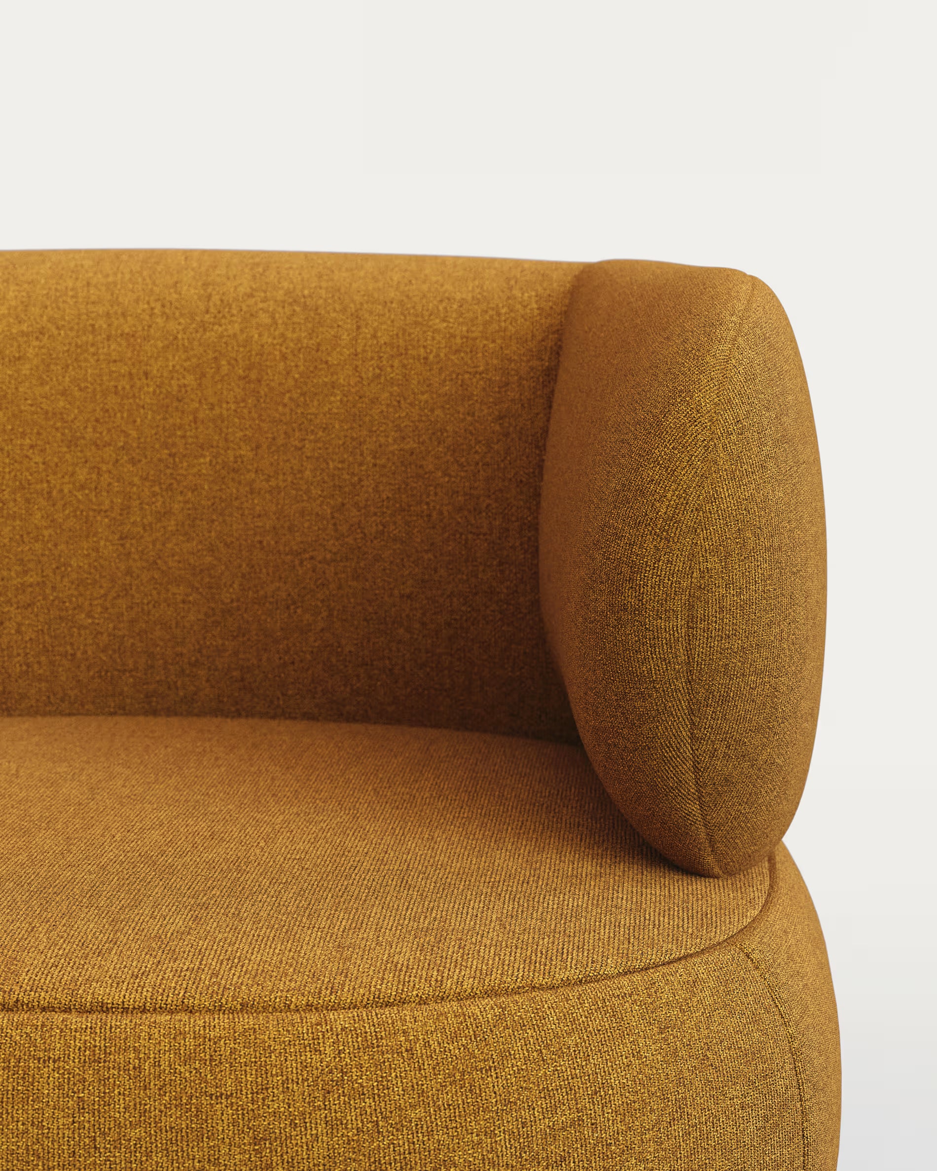 Close-up of a mustard yellow armchair on a white background