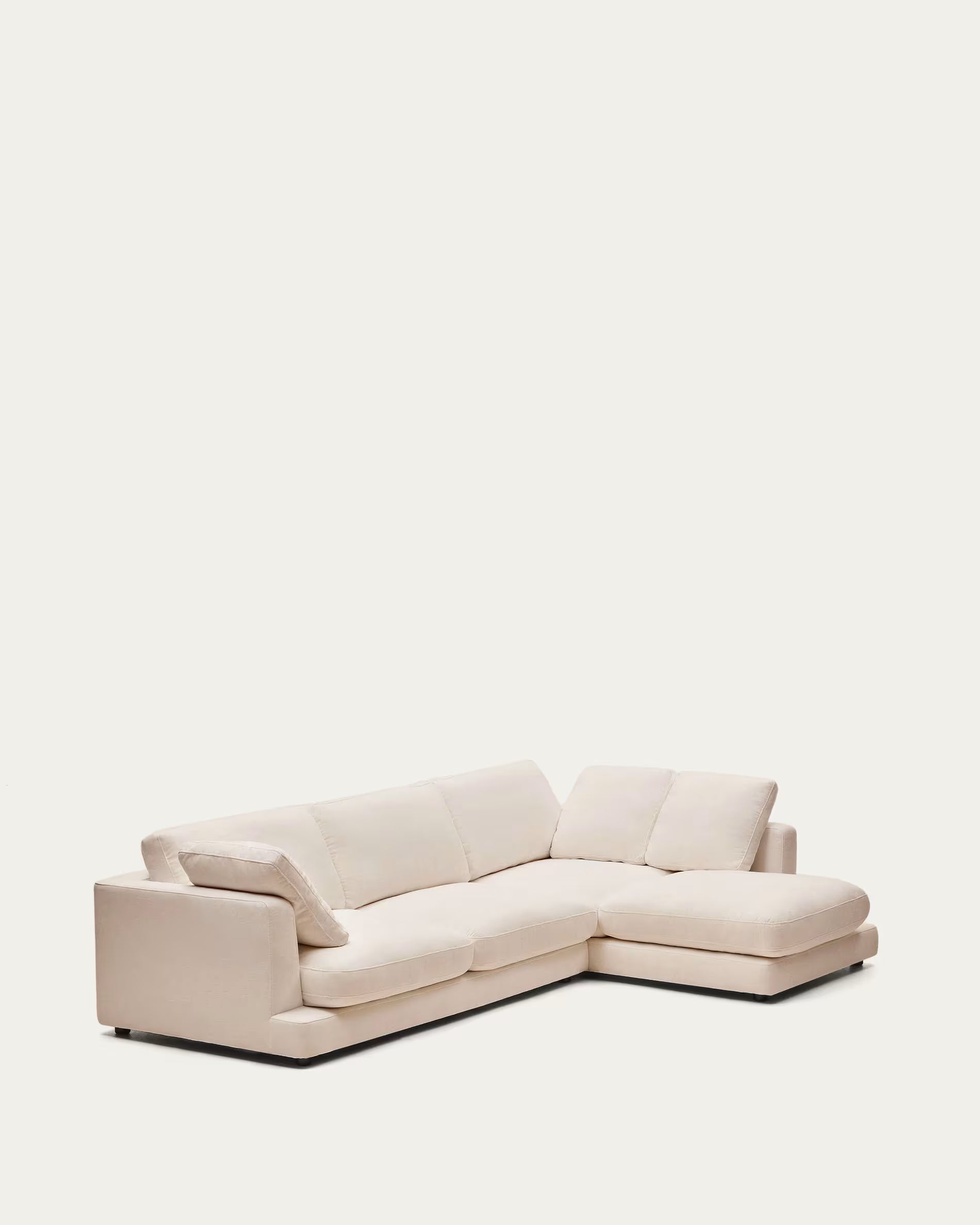 Beige sectional sofa on a white background