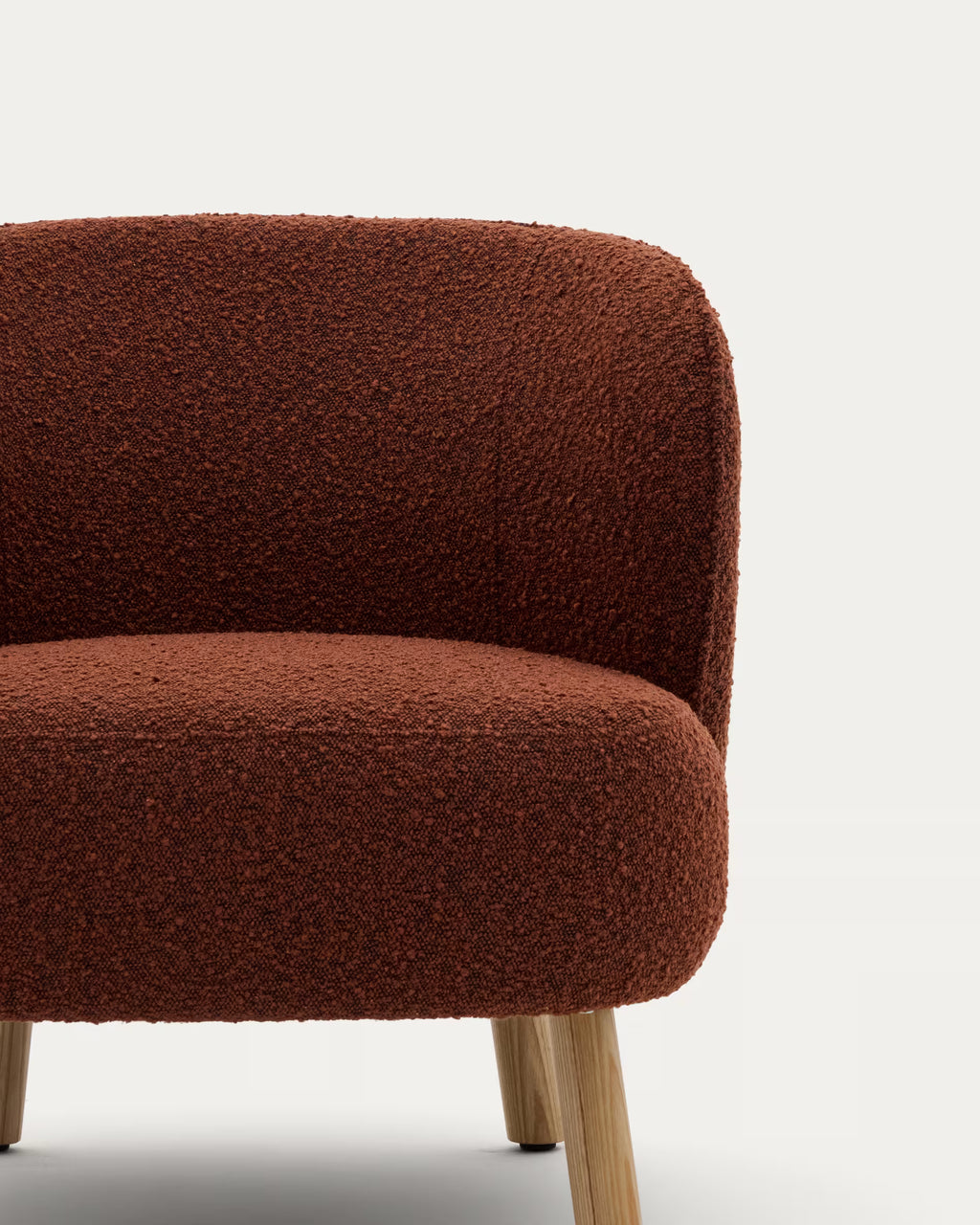 Brown textured armchair on a white background