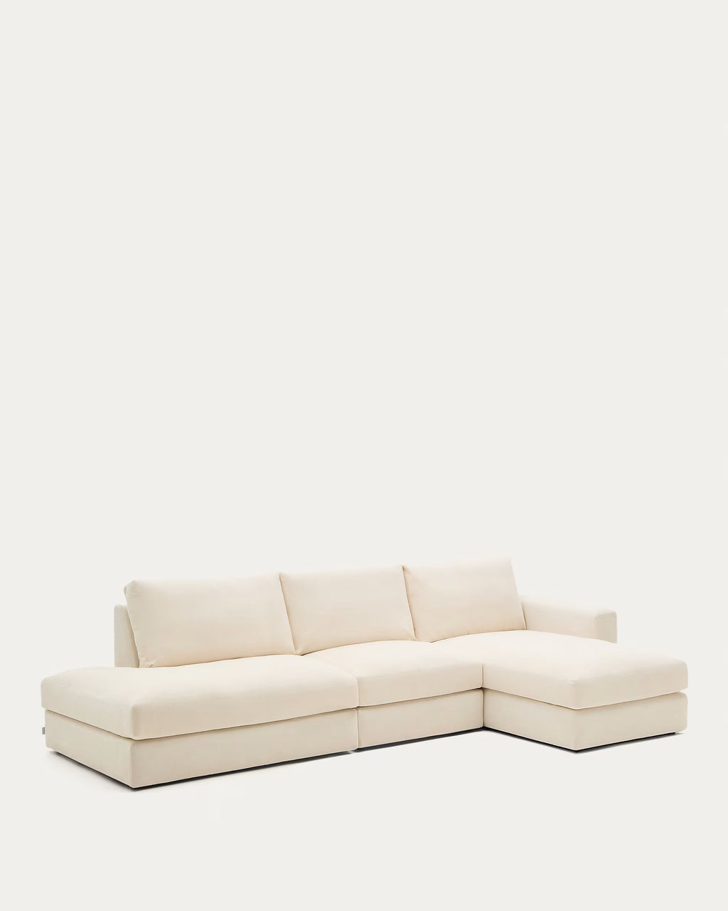 Beige sectional sofa on a white background