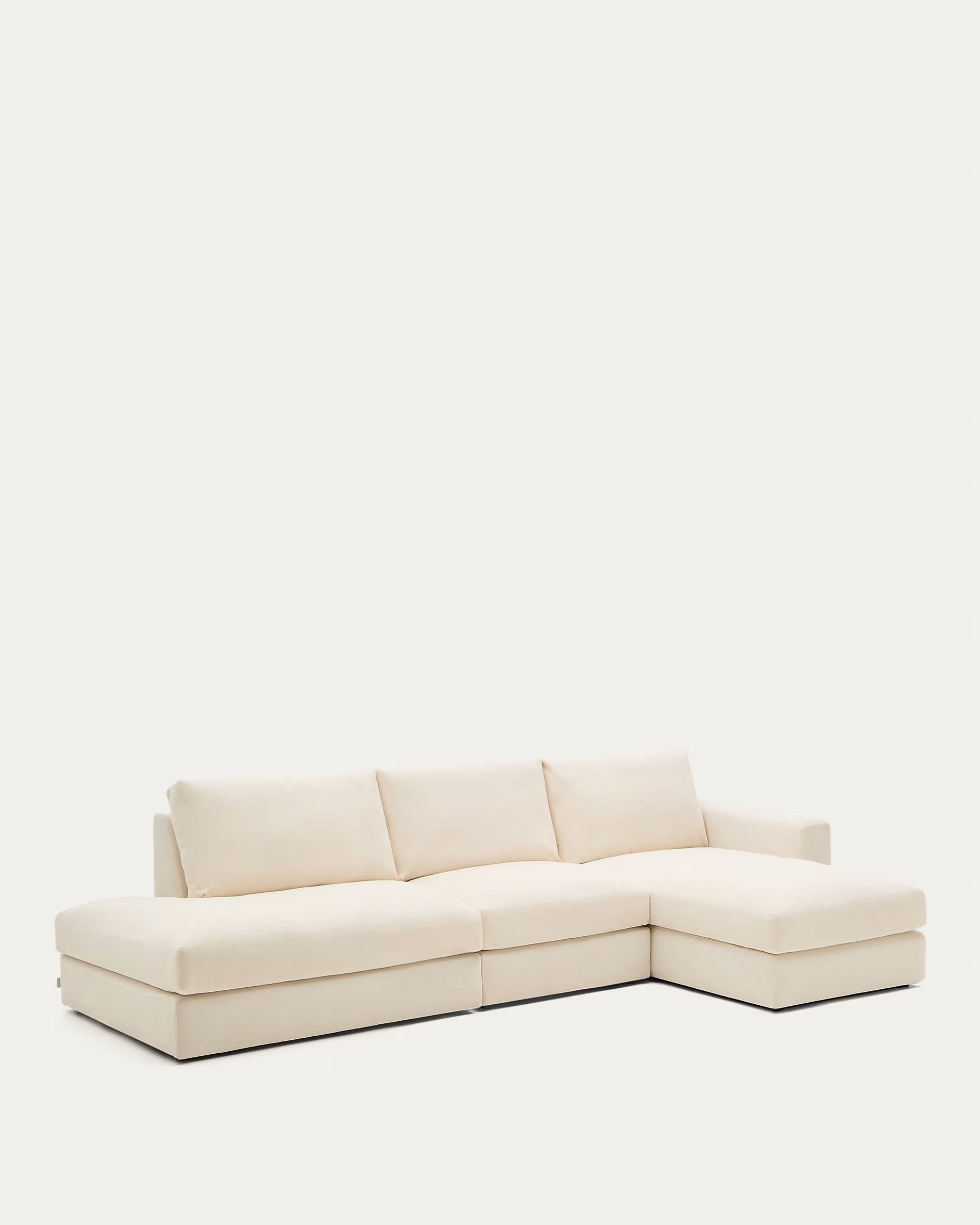 Beige sectional sofa on a white background