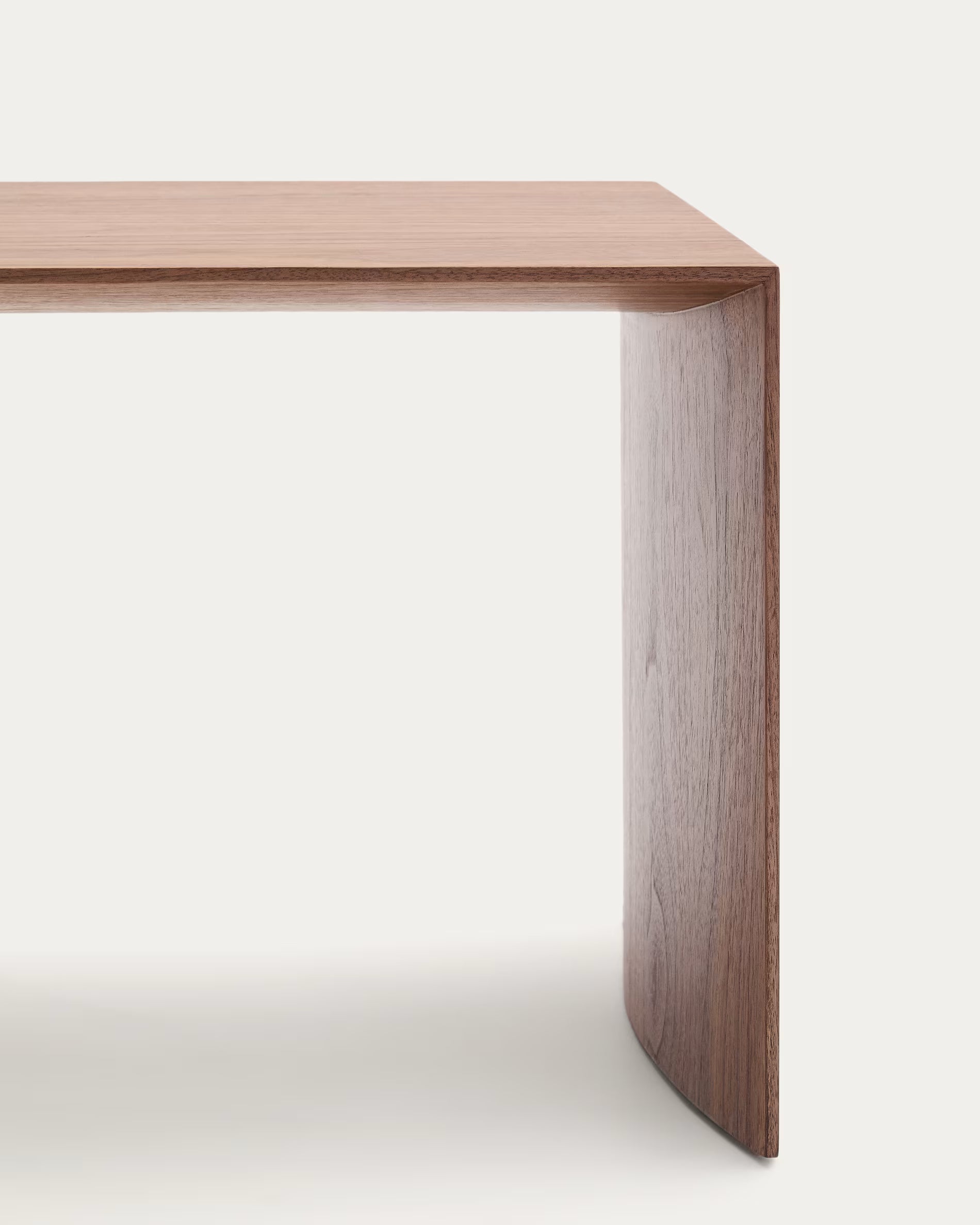 Wooden desk with a minimalist design on a white background
