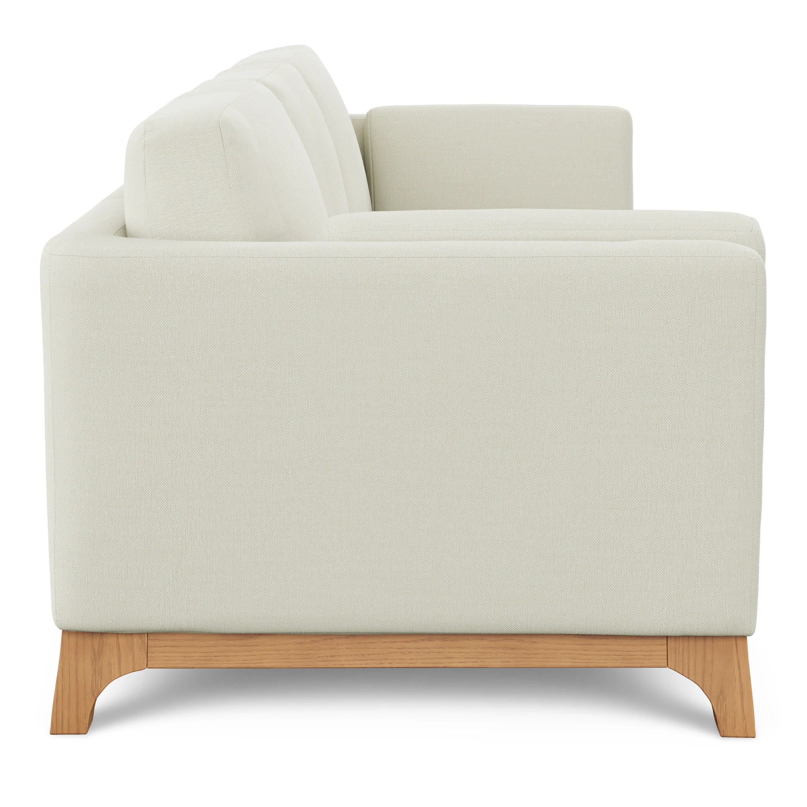 Beige armchair with wooden legs on a white background
